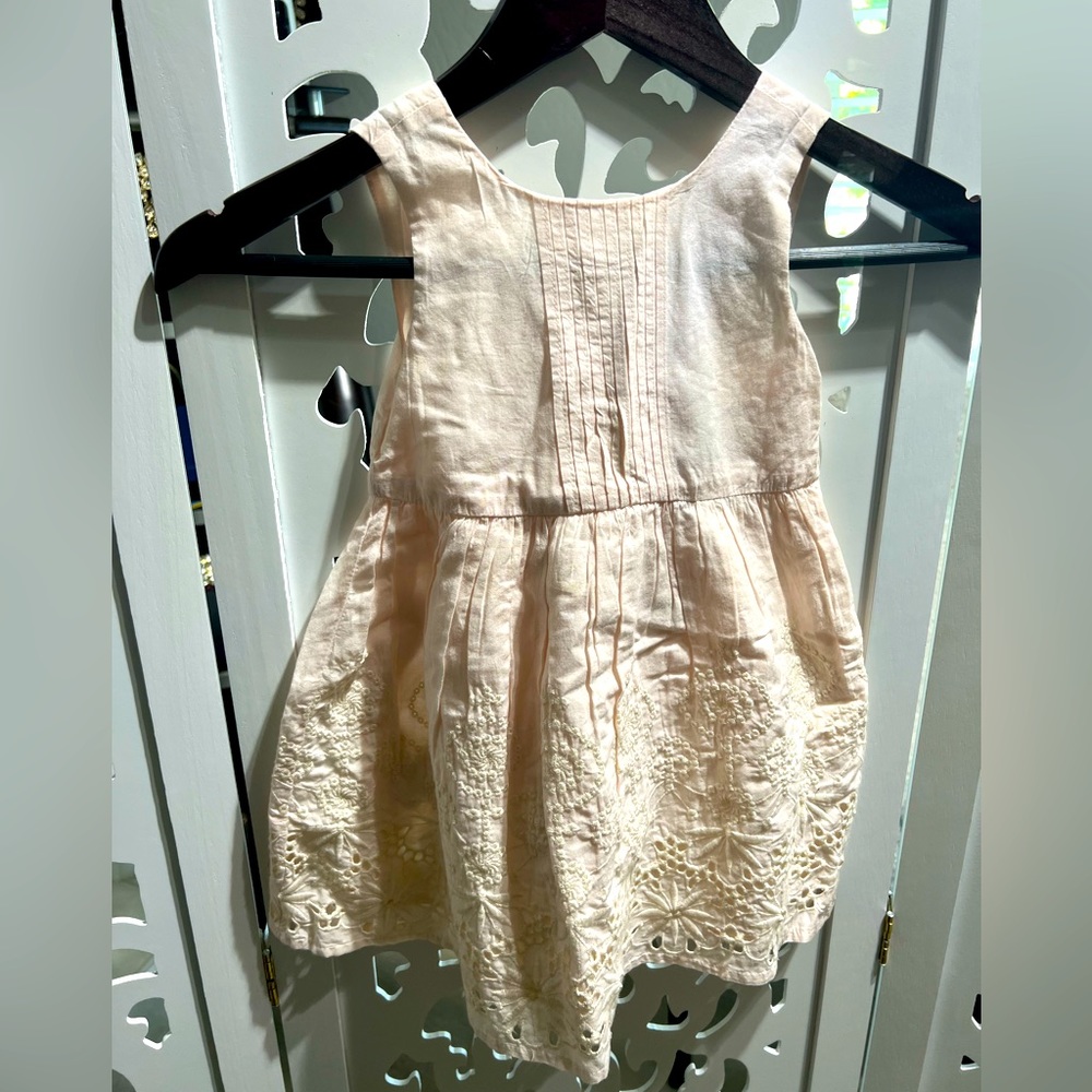 Brand new beautiful baby dress in size 24 months.
